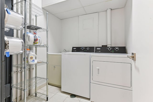 3200 Bde Maka Ska Pkwy Unit 302, Minneapolis, MN 55416 - laundry room with washing machine and clothes dryer and light tile patterned flooring
