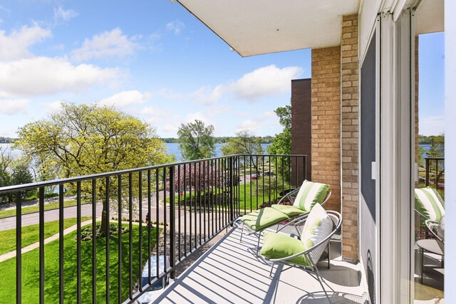 3200 Bde Maka Ska Pkwy Unit 302, Minneapolis, MN 55416 - balcony featuring a water view