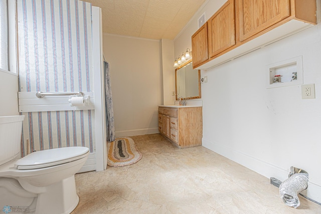 1524 1st Ave S, Fargo, ND 58103 - full bath featuring vanity, toilet, and wallpapered walls