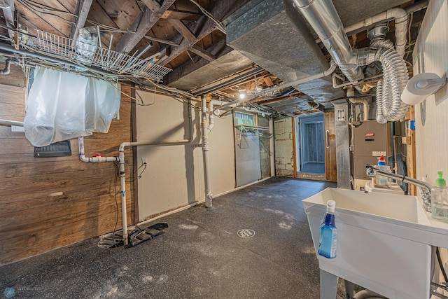 1524 1st Ave S, Fargo, ND 58103 - unfinished below grade area featuring a sink and heating unit