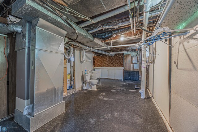 1524 1st Ave S, Fargo, ND 58103 - unfinished basement featuring heating unit