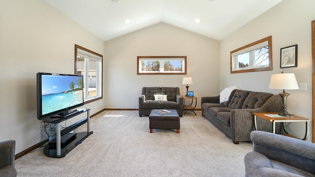 1001 Call Pl, Little Falls, MN 56345 - living area featuring vaulted ceiling, baseboards, and light carpet