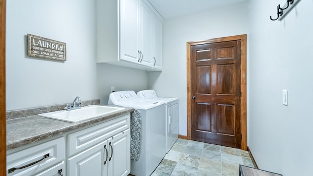 1001 Call Pl, Little Falls, MN 56345 - laundry room with cabinet space, washing machine and dryer, stone finish flooring, and a sink
