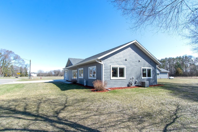 1001 Call Pl, Little Falls, MN 56345 - rear view of house featuring a lawn and cooling unit
