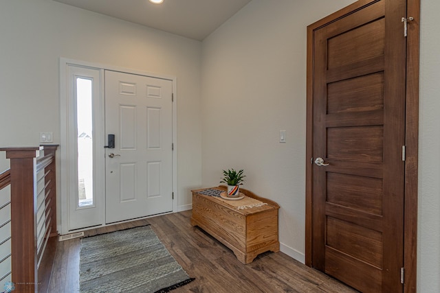 foyer with recessed lighting, visible vents, baseboards, and wood finished floors