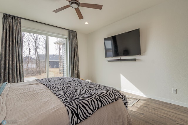 bedroom with recessed lighting, wood finished floors, baseboards, and ceiling fan