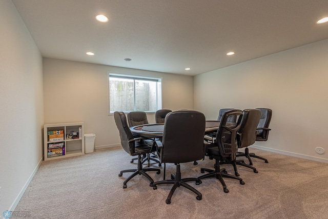 carpeted office space with recessed lighting and baseboards