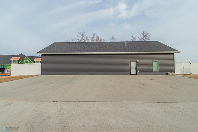 garage featuring fence