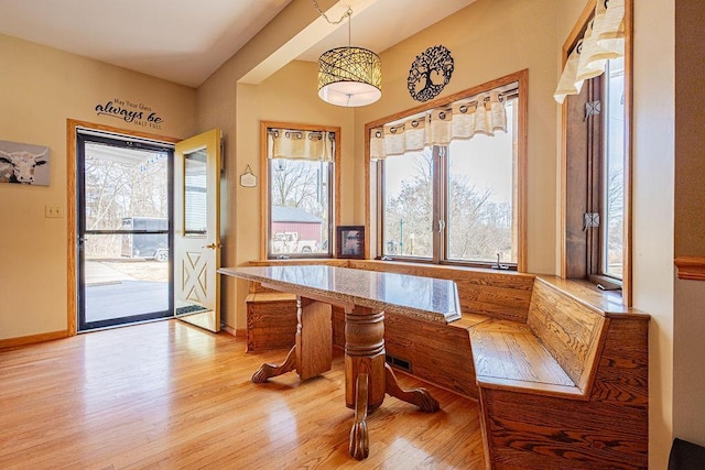 office space with visible vents, baseboards, and light wood-style floors