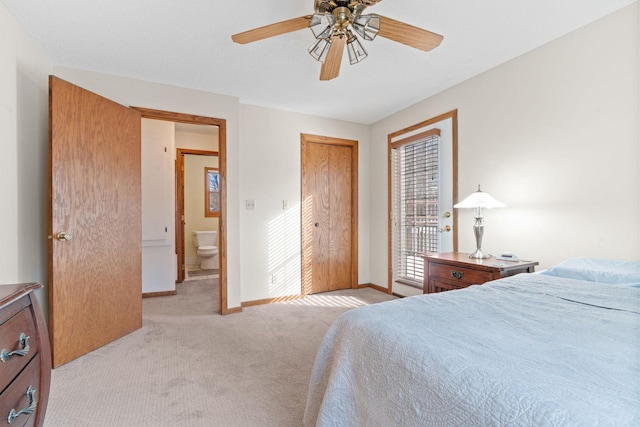 bedroom featuring light colored carpet, baseboards, and ceiling fan