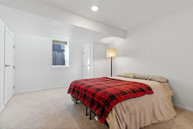 bedroom with recessed lighting, baseboards, and carpet