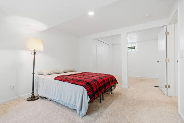 bedroom featuring recessed lighting, baseboards, and carpet floors