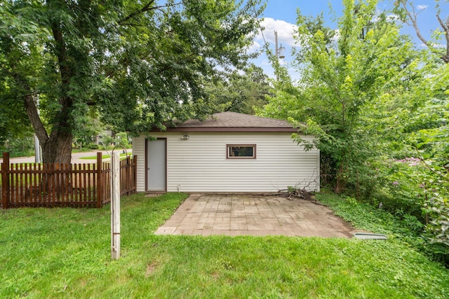 exterior space featuring a patio, a yard, and fence