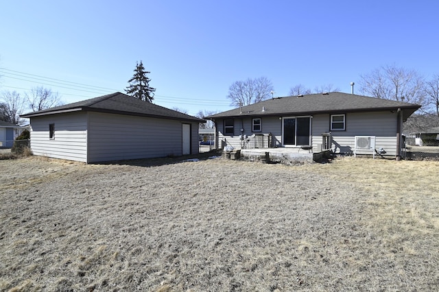 back of property featuring fence