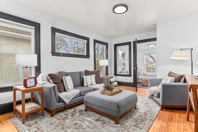 living area featuring hardwood / wood-style floors