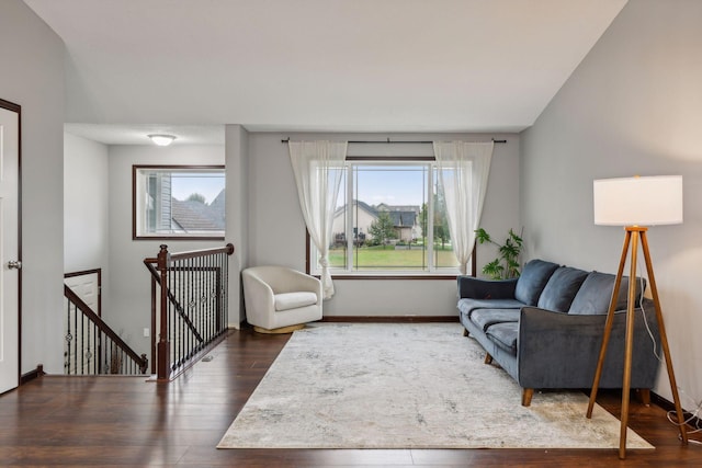 living room with wood finished floors and baseboards