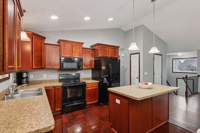 kitchen with black appliances, light countertops, and a sink