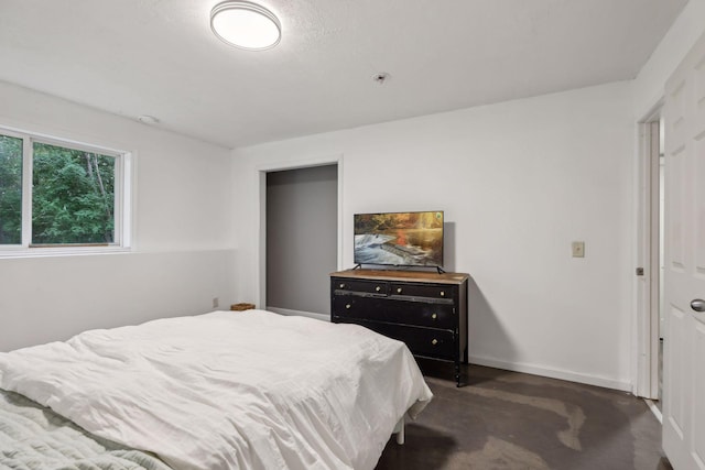 bedroom featuring baseboards