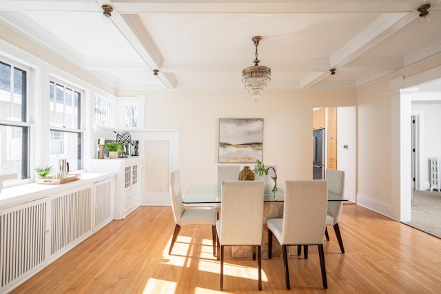 dining space with beam ceiling, a notable chandelier, coffered ceiling, and light wood-type flooring