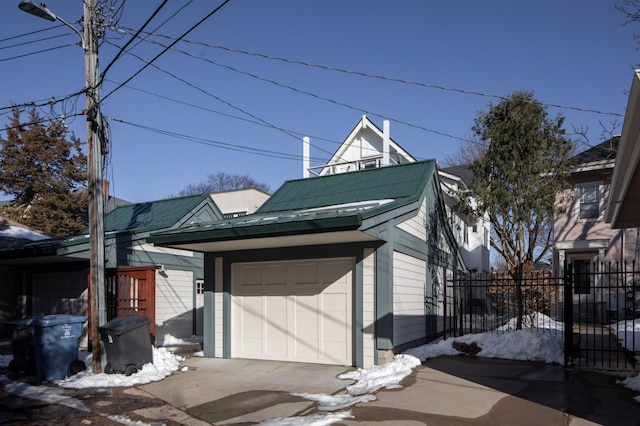 exterior space with fence and driveway