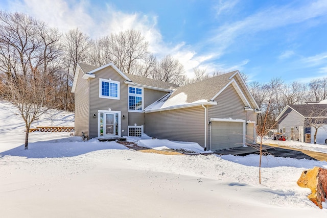 traditional-style home featuring an attached garage