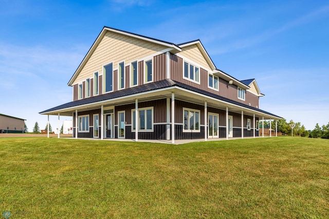 exterior space featuring a yard and board and batten siding