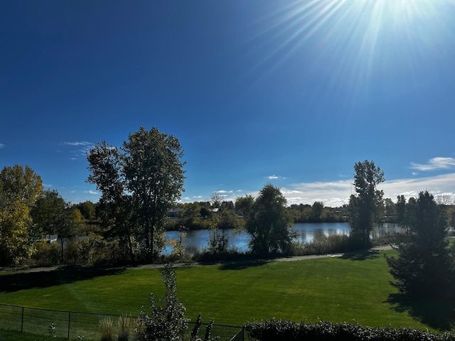 water view featuring fence