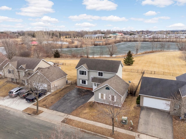 drone / aerial view with a water view