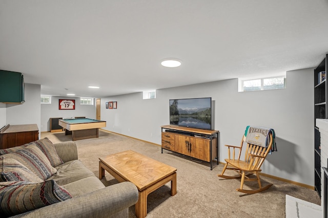 living room with pool table, a brick fireplace, baseboards, and light carpet