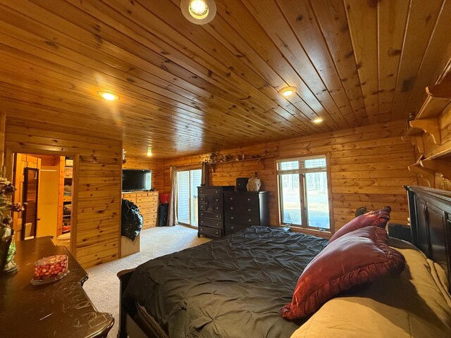 bedroom featuring recessed lighting, wooden walls, wooden ceiling, and carpet flooring