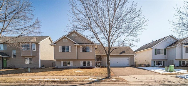 view of front of house with a garage and driveway