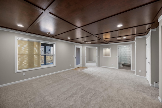 below grade area featuring recessed lighting, baseboards, and light carpet