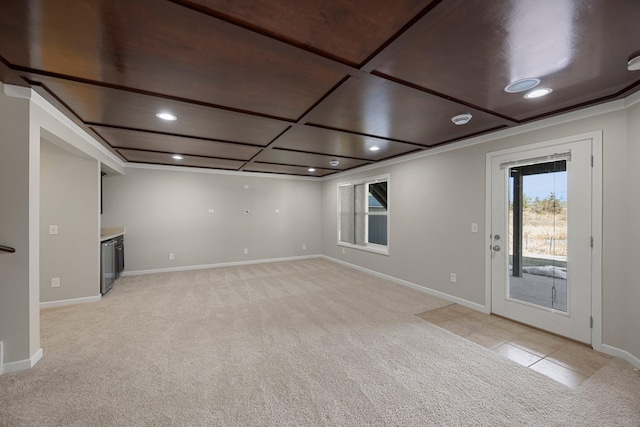 basement with light colored carpet and baseboards