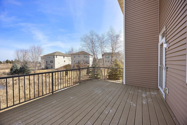 wooden deck featuring a residential view