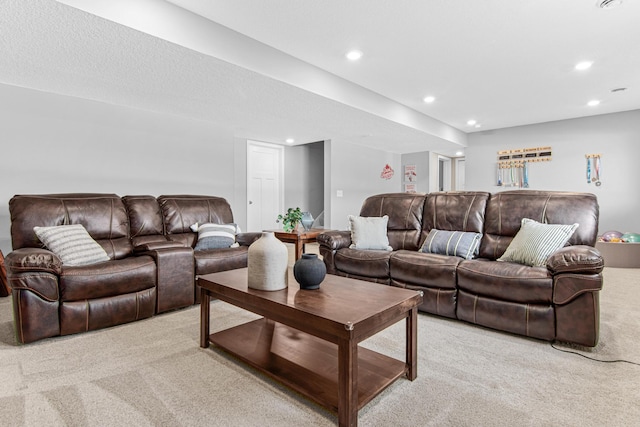 carpeted living room featuring recessed lighting