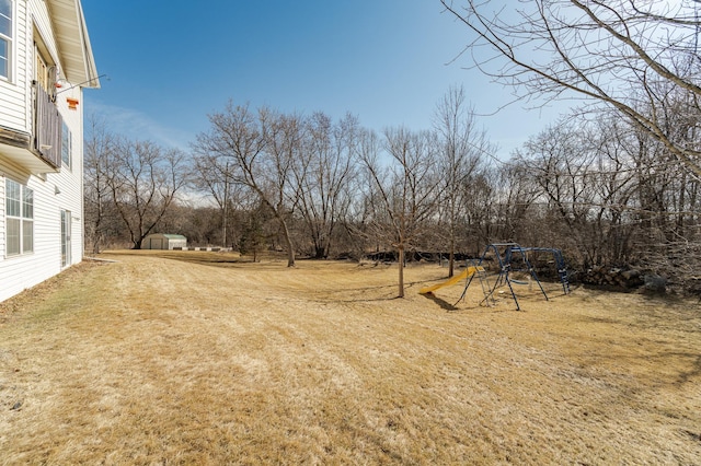 view of yard with a playground