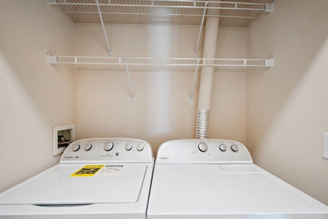 laundry area with washer and dryer and laundry area