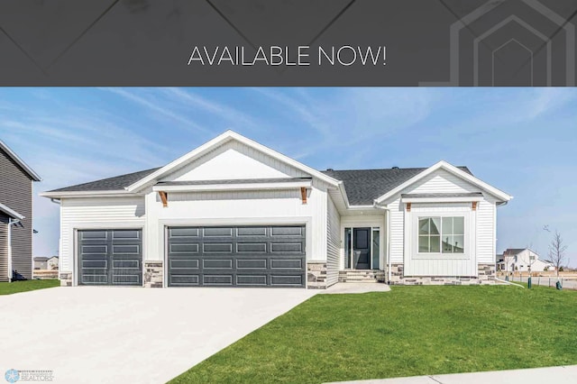 view of front of home featuring stone siding, an attached garage, a front lawn, and concrete driveway