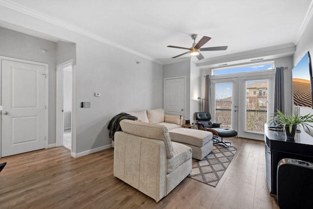 13580 Technology Dr Unit 3202, Eden Prairie, MN 55344 - living area featuring light wood finished floors, ornamental molding, ceiling fan, french doors, and baseboards