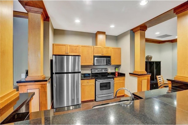 13580 Technology Dr Unit 3202, Eden Prairie, MN 55344 - kitchen featuring stainless steel appliances, ornate columns, a sink, dark countertops, and recessed lighting