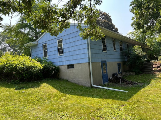 1711 Winnetka Ave N, Golden Valley, MN 55427 - view of property exterior featuring a lawn