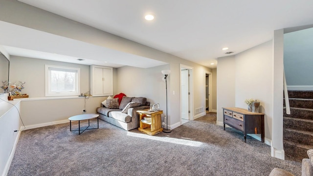 carpeted living area with stairway, recessed lighting, visible vents, and baseboards