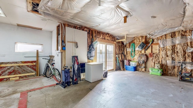 interior space featuring a healthy amount of sunlight and concrete flooring