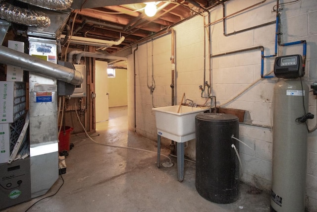 unfinished basement with heating unit and a sink