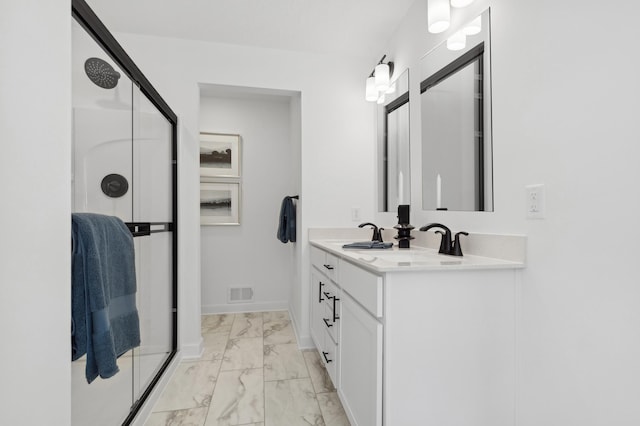 bathroom featuring visible vents, double vanity, a stall shower, a sink, and marble finish floor