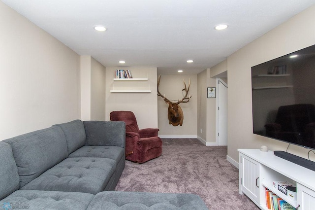 living area featuring carpet flooring, recessed lighting, and baseboards