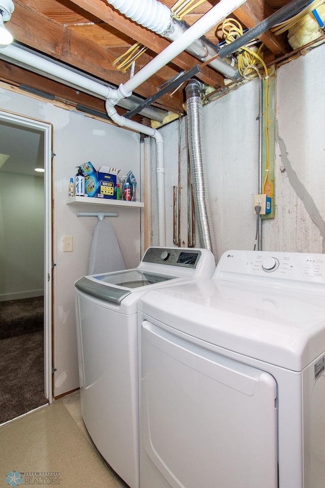 laundry area with laundry area and washer and dryer