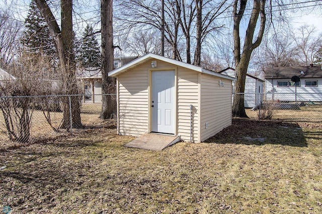 view of shed featuring a fenced backyard