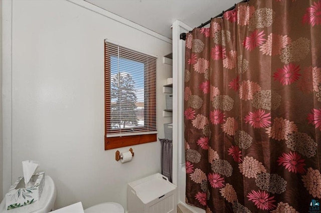 3729 2nd St, Superior, WI 54880 - bathroom with toilet and a shower with shower curtain