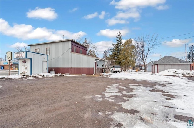 3729 2nd St, Superior, WI 54880 - view of snow covered exterior featuring an outdoor structure
